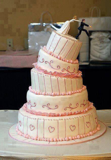 Wedding - Ivory and pink wedding cake with bride and groom
