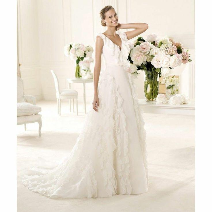 Wedding - Wedding Gown with beautiful frills on the neck and at the bottom.