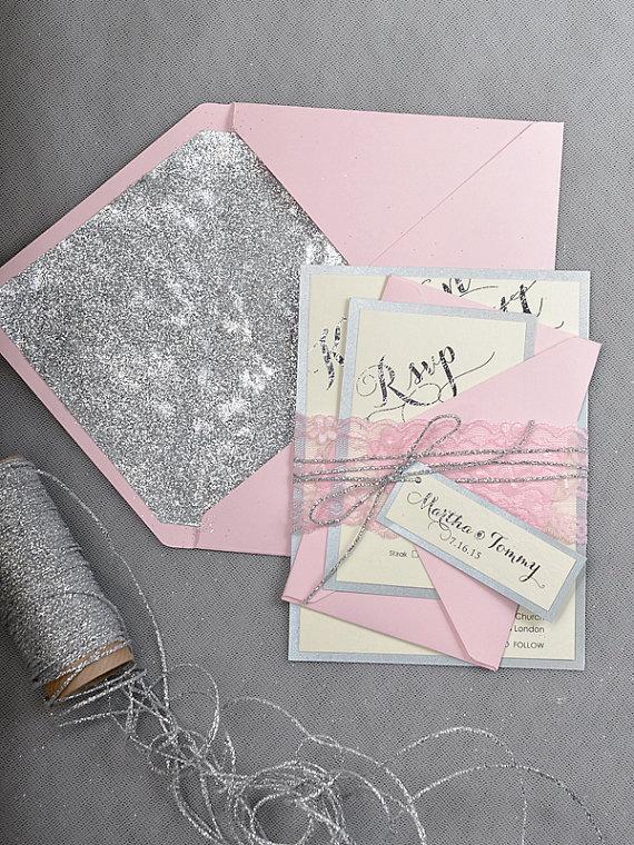 Wedding invitations in pink and silver