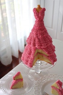 wedding photo - Gown shaped pink wedding cake