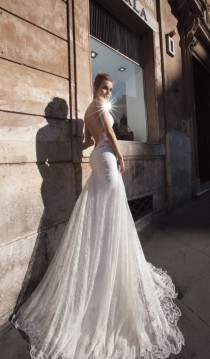 wedding photo - Backless wedding dress with fine floral designs