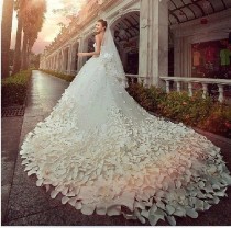 wedding photo - White wedding dress decorated with petals
